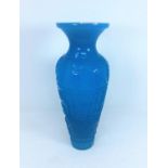 A Chinese Peking glass style blue vase decorated in relief, with seal mark to base, height 29cm
