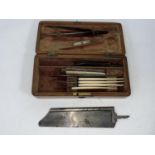 A 19th century field surgeons kit in mahogany case (incomplete)