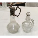 A Victorian frosted glass decanter of swelling form with silver plated embossed lid, collar and