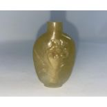 A Chinese carved hardstone snuff bottle with figures and scenery, 7cm; another jade coloured hard