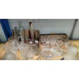 Two cut glass decanters; 2 cut water jugs; 2 sets of 6 cut wines; glassware