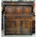 A mid 18th century country made oak duodarn, the upper section with moulded and dentil cornice, 3