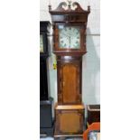 A 19th century crossbanded oak and mahogany longcase clock with brass finials, swan neck pedestal