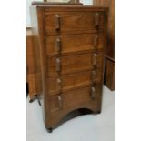 An 1930's oak chest of 5 drawers 55cm