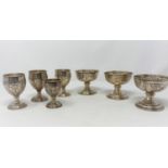 Three American ice cream cups with embossed floral decoration and monogram, S & Co 900, height