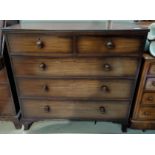 An early 20th century mahogany chest of 3 long and 2 short drawers, height 105 cm, length 108 cm