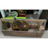 A butcher's large spring balance by Salter; a carpenter's toolbox