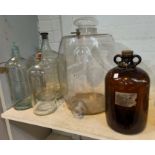A brewers glass demijohn, three vintage bottles and another