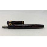 A gents pair of studs in yellow metal and seed pearls; a 1930's Parker Duofold fountain pen