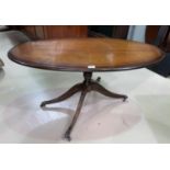 A reproduction mahogany oval occasional table, a similar drop end occasional table