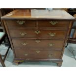 A 19th century mahogany Georgian style bachelors chest of 3 long and 2 short drawers, with brass