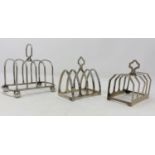 Three hallmarked silver 4 division taost racks, various dates and makers, 5.7oz