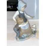 A Lladro group girl with boy & goose 27cm