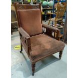 An Edwardian carved walnut armchair