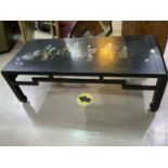 A modern black lacquer Chinese style rectangular coffee table with painted top