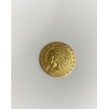 A gold 1909 'D' Liberty coin with native American and eagle head