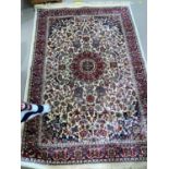 A Kashmir rug with floral design on ivory ground, 170 x 120 cm