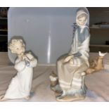 2 Lladro groups - seated girl with bird; boy with flute 25 & 26cm
