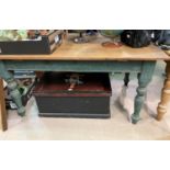 A Victorian style pine kitchen table with rectangular top, on painted base