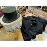 A vintage top hat and tails