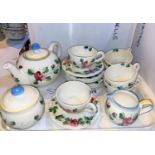 A Royal Standard harlequin tea service depicting roses; a Laura Ashley hand painted tea service