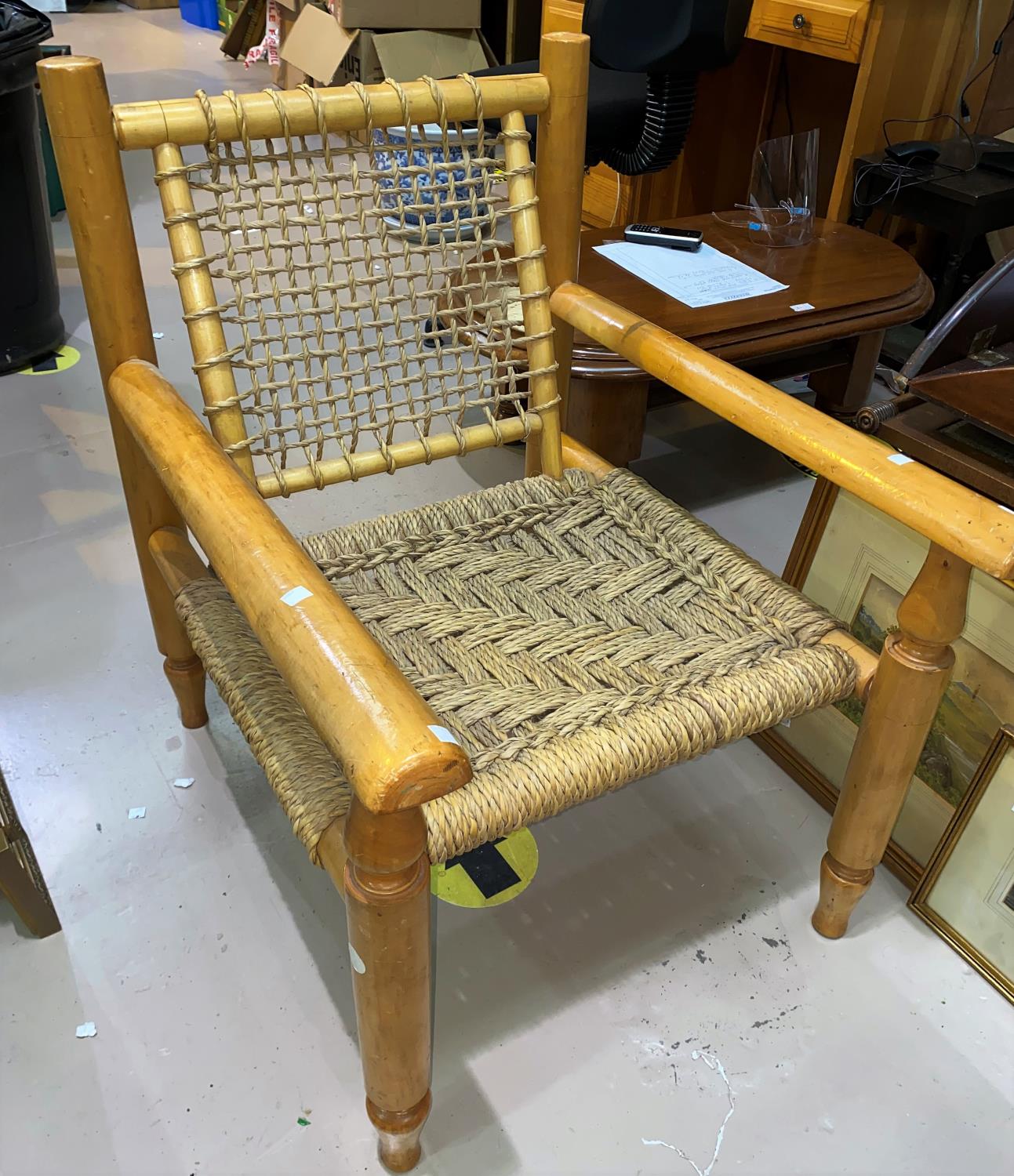 A continental pair of veranda chairs, with woven seagrass seats and backs