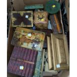 A "row of books" biscuit tin and other tins