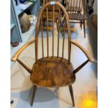 An ercol hoop back carver chair