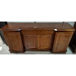 A large Victorian mahogany reverse breakfront 4 door sideboard with frieze drawer, double cupboard