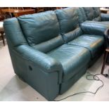 A 3 seater green leather reclining settee