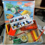 A 1960's/70's mechanical tractor set by Mettoy, in original box; a Robertson's 11 piece 'Golly' band
