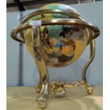 A modern coloured plastic terrestrial globe in gilt metal gimbal stand
