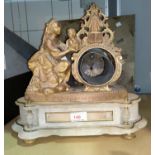 A 19th century French mantel clock case in ornate gilt metal and white marble, surmounted by a woman