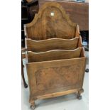 A walnut magazine rack with 3 divisions; a 1960's nest of 3 occasional tables; a Chinese rug