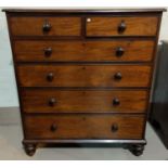 A Victorian mahogany chest of 4 long and 2 short drawers with turned knob handles and feet, width