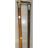 A silver top walking cane, another with horn handle and silver collar
