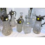 Four 20th century claret jugs and 4 cut decanters
