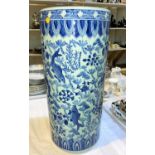 A modern Chinese blue & white cylindrical stick stand; a similar vase; an Imari vase; a modern
