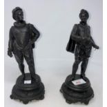 A pair of modern bronze figures: 18th century men with swords, height 25 cm