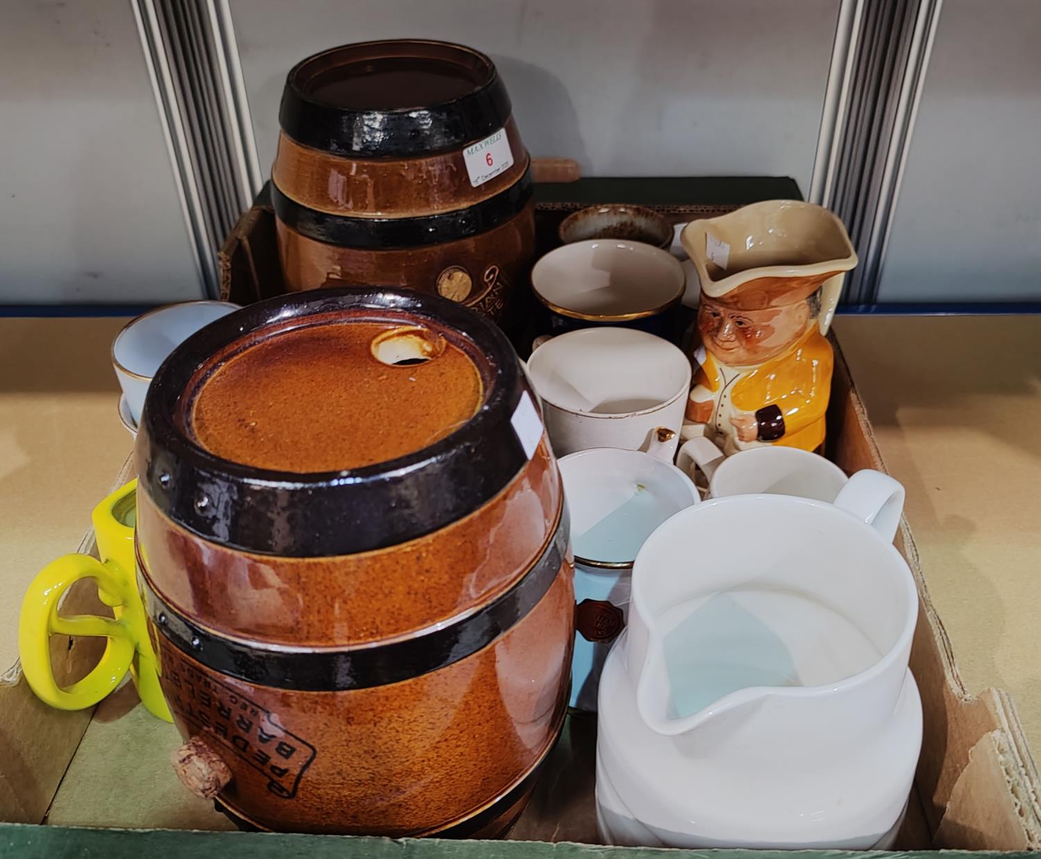 2 19th Century Doulton Lambeth pottery barrels; a selection of commemorative mugs & a large