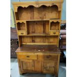 A natural pine small kitchen dresser with delft rack, 103 cm