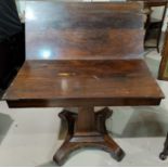 A late Regency rosewood turnover tea top table on tapering square pedestal support, 99cm (loss of v