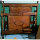 An Edwardian 4'6" bed in inlaid mahogany