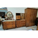 A 1930's oak bedroom suite comprising wardrobe 115cm, dressing table 99cm, washstand 99cm and a bed