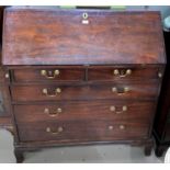 A Georgian crossbanded mahogany bureau with fall front fitted interior, 3 long and 2 short drawers