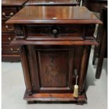 A reproduction pair of dwarf chests of drawers in mahogany; a similar cabinet
