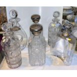 Two pairs of cut decanters; 2 others