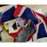 A Union Jack and other flags etc