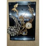 A 9ct gold cased watch and other items of brooches etc