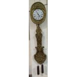 A 19th century French Comtoise wall clock with white painted enamel dial and ornate embossed brass